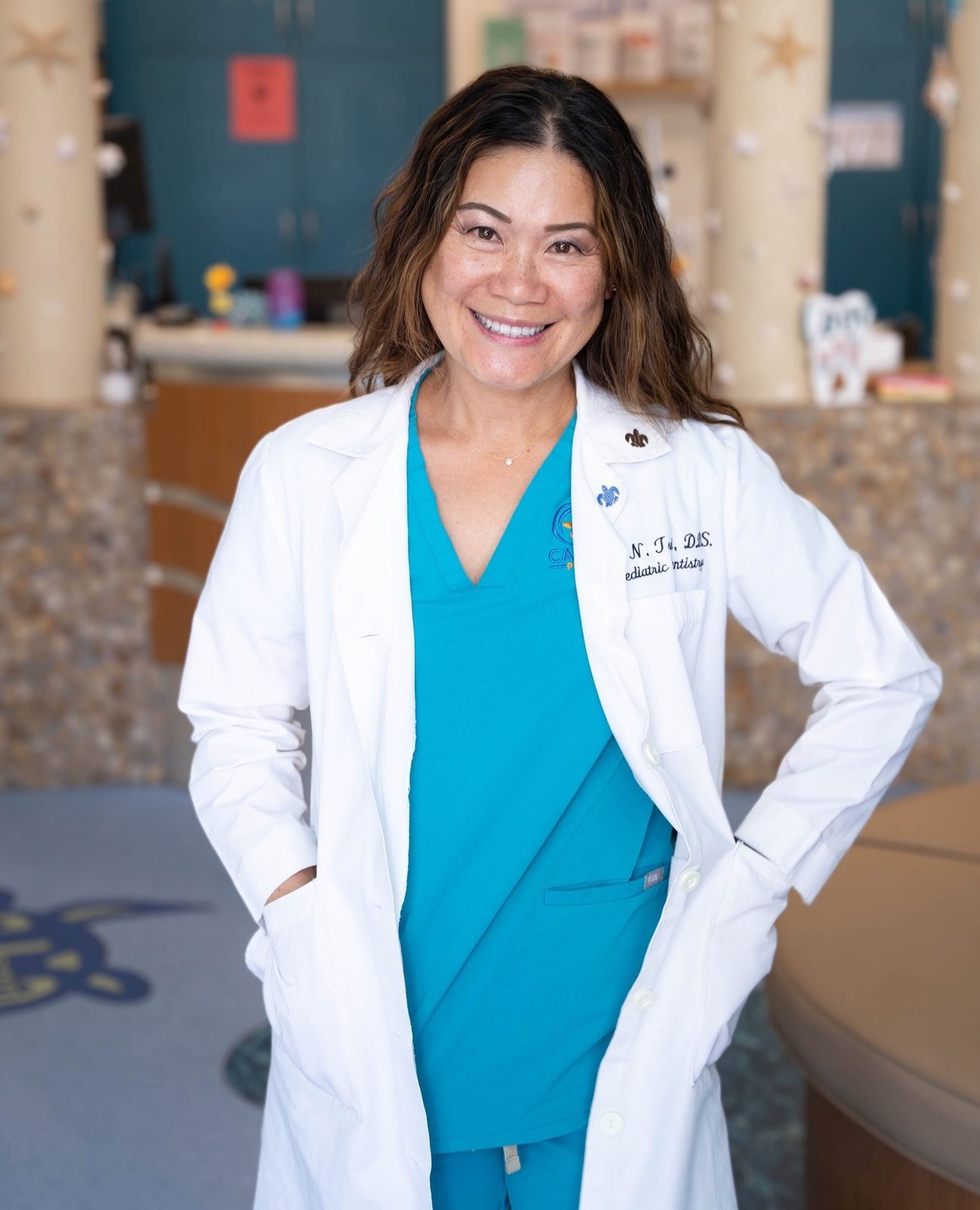 Dr. Linh Tsai in the CarlsbaDDS Pediatric Smiles lobby